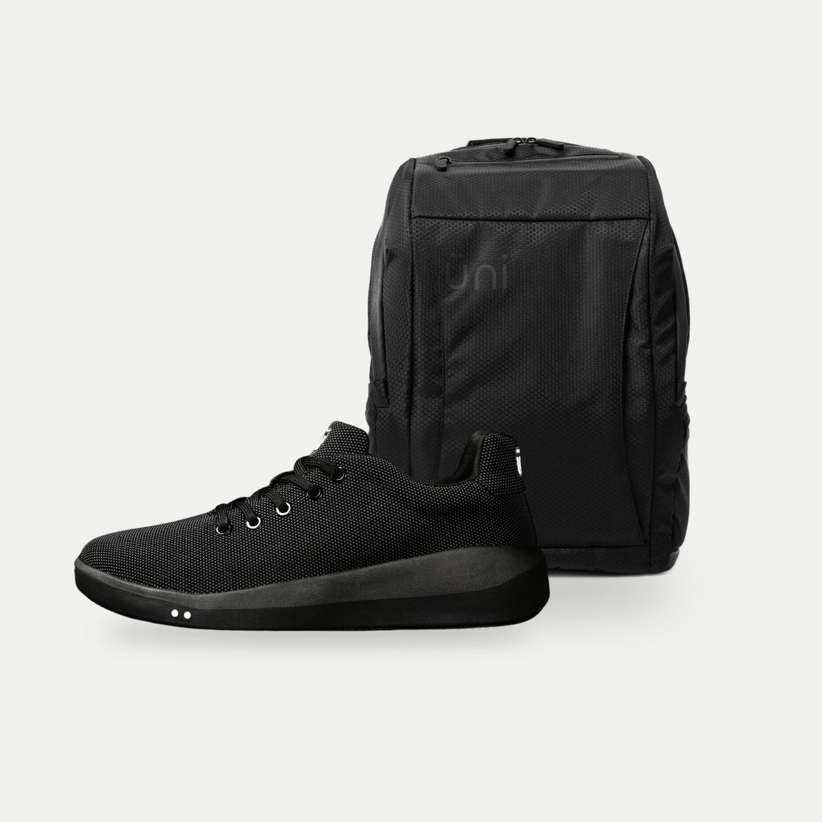 24/7 Kit: Perform and the 24/7 Backpack on stone
