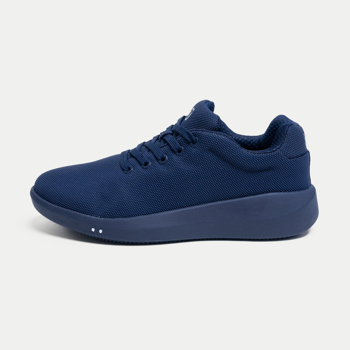 Perform Navy, Low, three-quarter view on stone