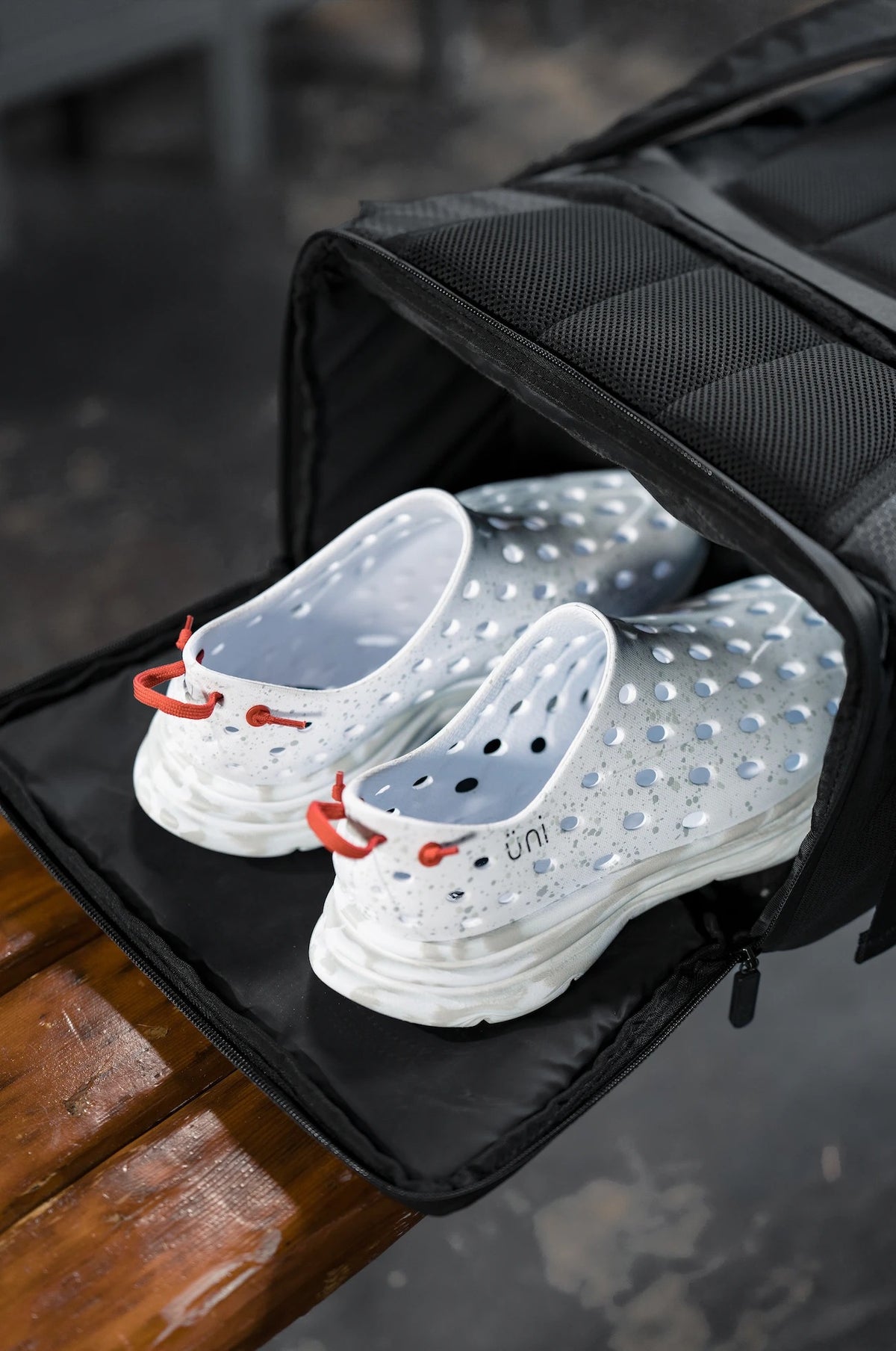 Kane recovery shoes in the 24/7 backpack shoe compartment